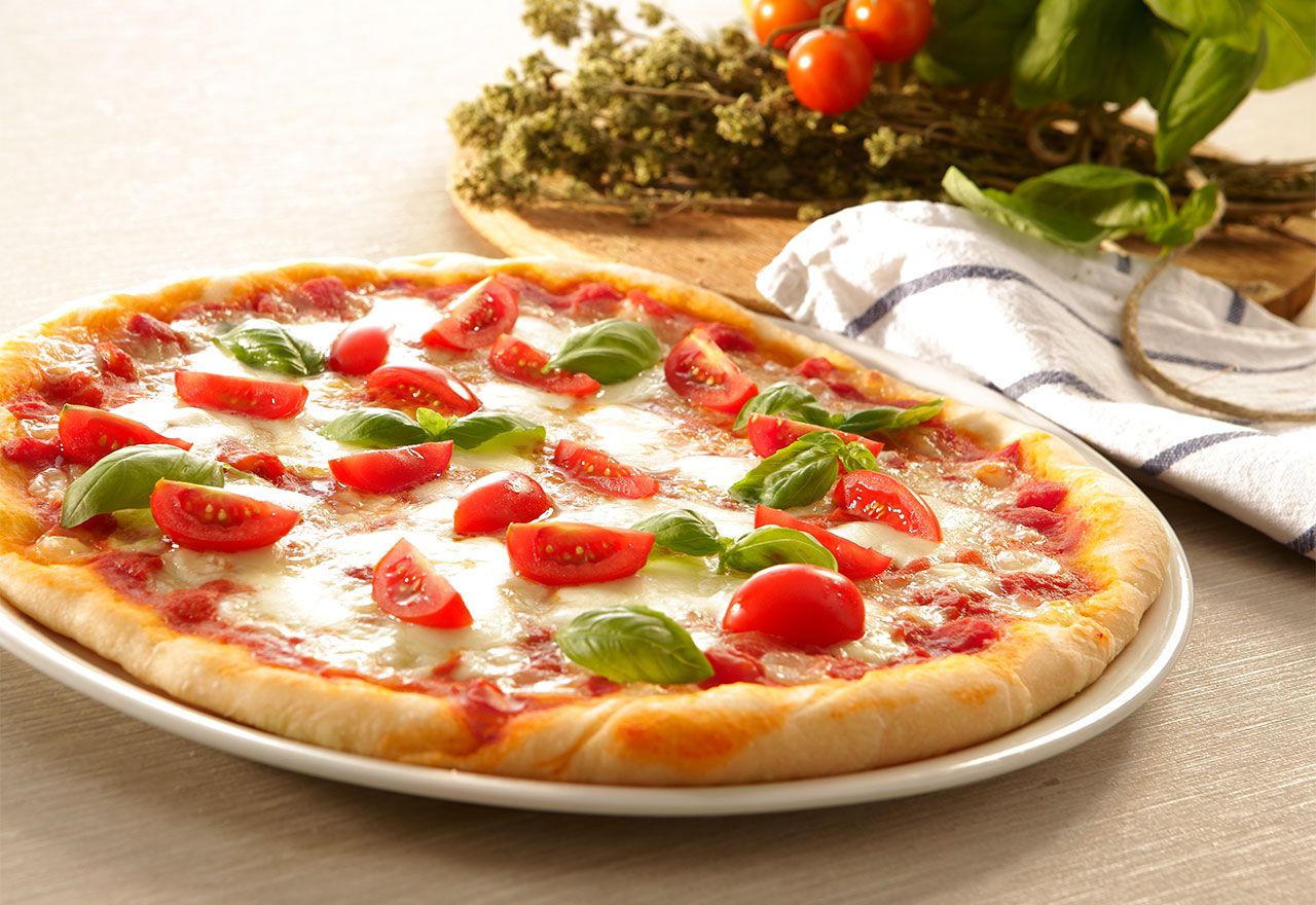 Americans eat approximately 100 acres of pizza a day or about 350 slices per second. There are approximately 61,269 pizzerias in the United States. Each person in America eats about 46 pizza slices a year.