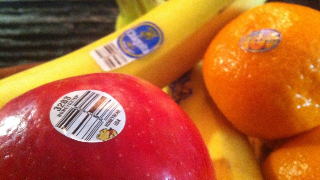 According to the FDA, the stickers on fruit are edible.