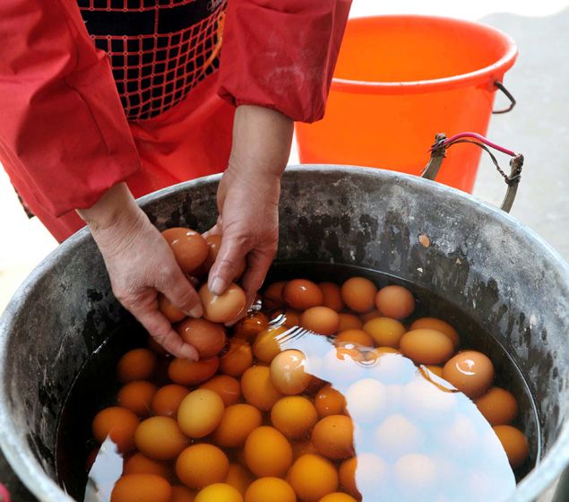 Eggs boiled in the urine of young virgin boys are a spring delicacy in Dongyang, China.